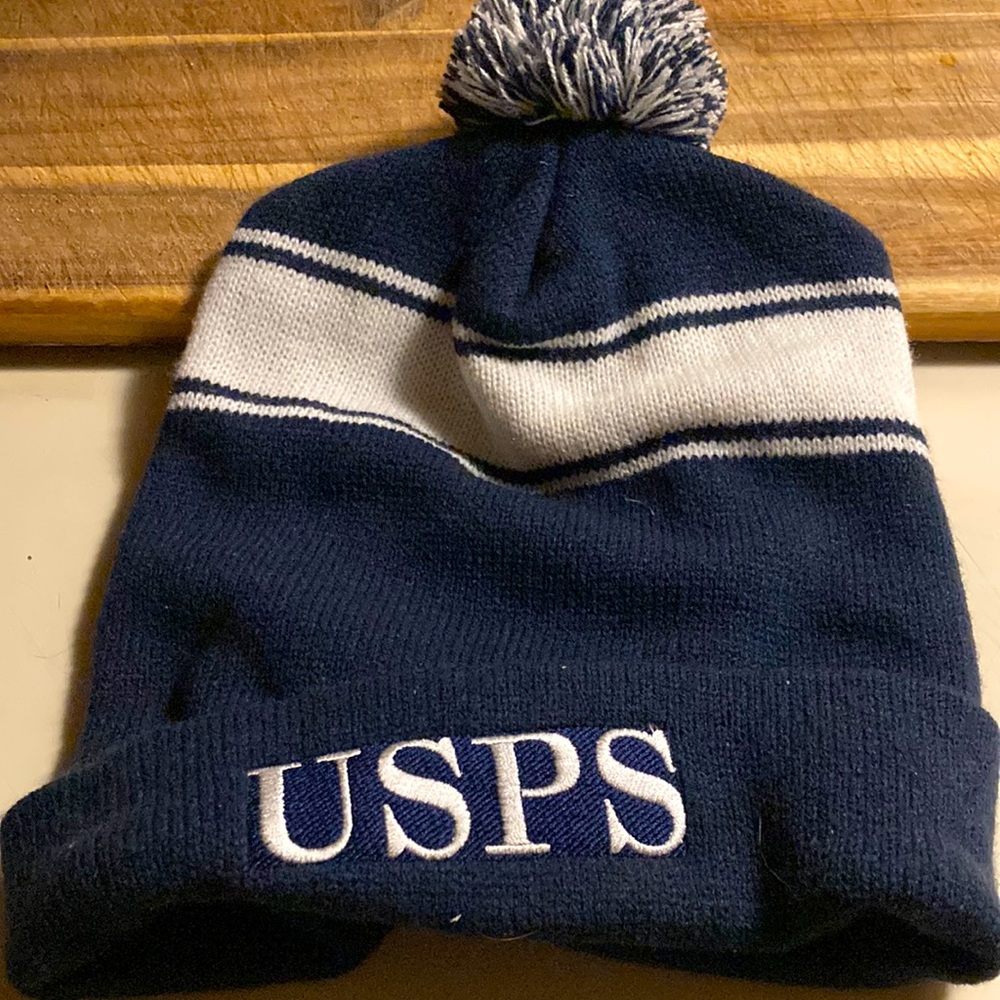 USPS winter cap in blue and white with super cute Pom Pom😂